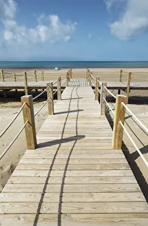 Walkway: Wooden footbridges at the beach of Riumar - environs