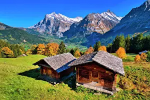 Huts: Wooden huts above Grindelwald, behind them Wetterhorn