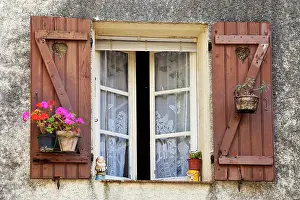 Shutter: Wooden shutters and window to home in historic