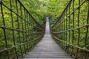 Bridge: Wooden suspension bridge over a gorge