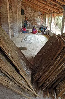 Silkworms: Workers sorting silkworm coccoons in an Indian