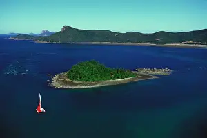 Yachts: Yacht sailing past Plum Pudding Island
