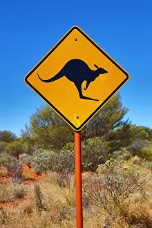 Signs: Yellow kangaroo wildife warning sign at Uluru, Ayers