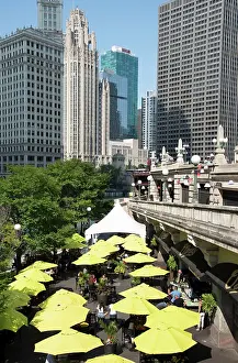 Cafe: Yellow umbrellas at cafe at Riverwalk along the Chicago