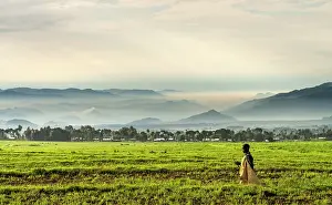 Rwanda: Young Farmer at dawn