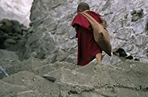 Monks: Young monk and dog Monastery Thiksey Leh India