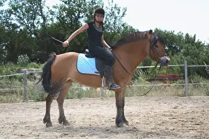 Insensitive: Young rider performing a relaxation exercise