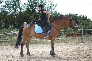 Exercise: Young rider performing a relaxation exercise