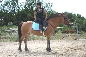 Exercise: Young rider performing a relaxation exercise