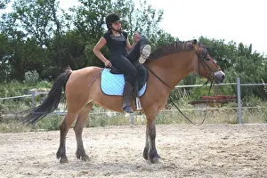 Exercise: Young rider performing a relaxation exercise