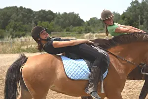 Supple: Young riders performing a relaxation exercise