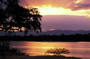 Zambezi: Zimbabwe. View of Zambezi River at sunset