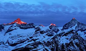 Hour: Zinalrothorn with snow in red dawn glow, Dent Blanche