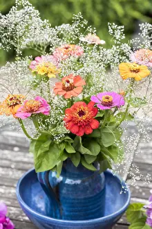 Bouquet: Zinnias bouquet on a garden table
